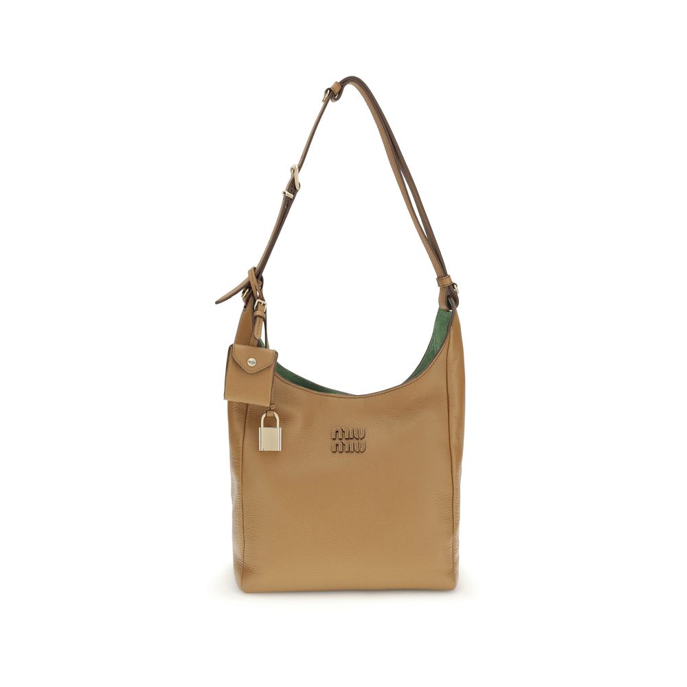 Miu Miu Beige Calf Leather Bos Taurus Backet Bag - Luxe Nova