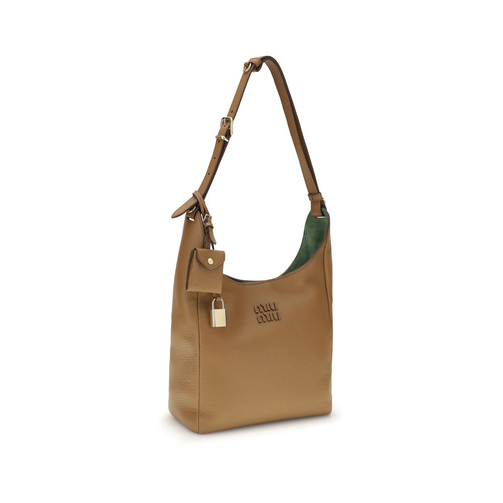 Miu Miu Beige Calf Leather Bos Taurus Backet Bag - Luxe Nova